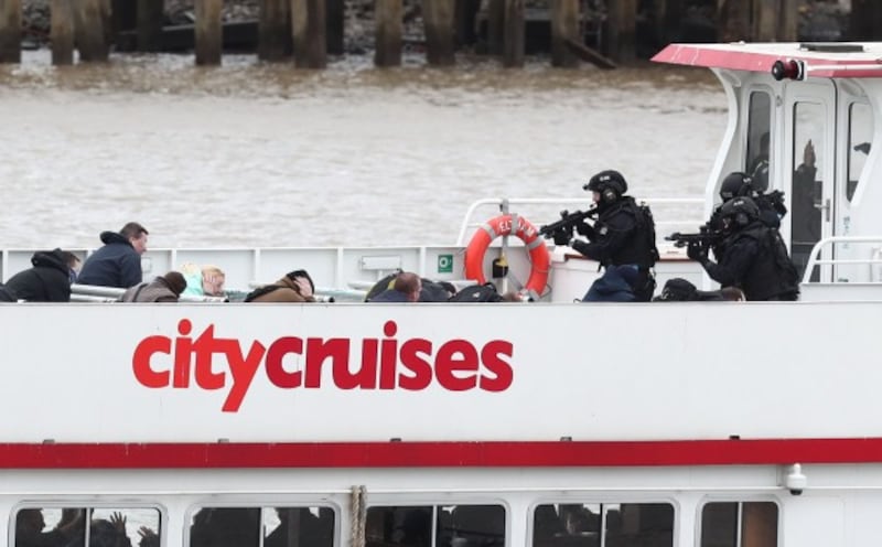 Armed police boarded the boat in the exercise (Gareth Fuller/PA)