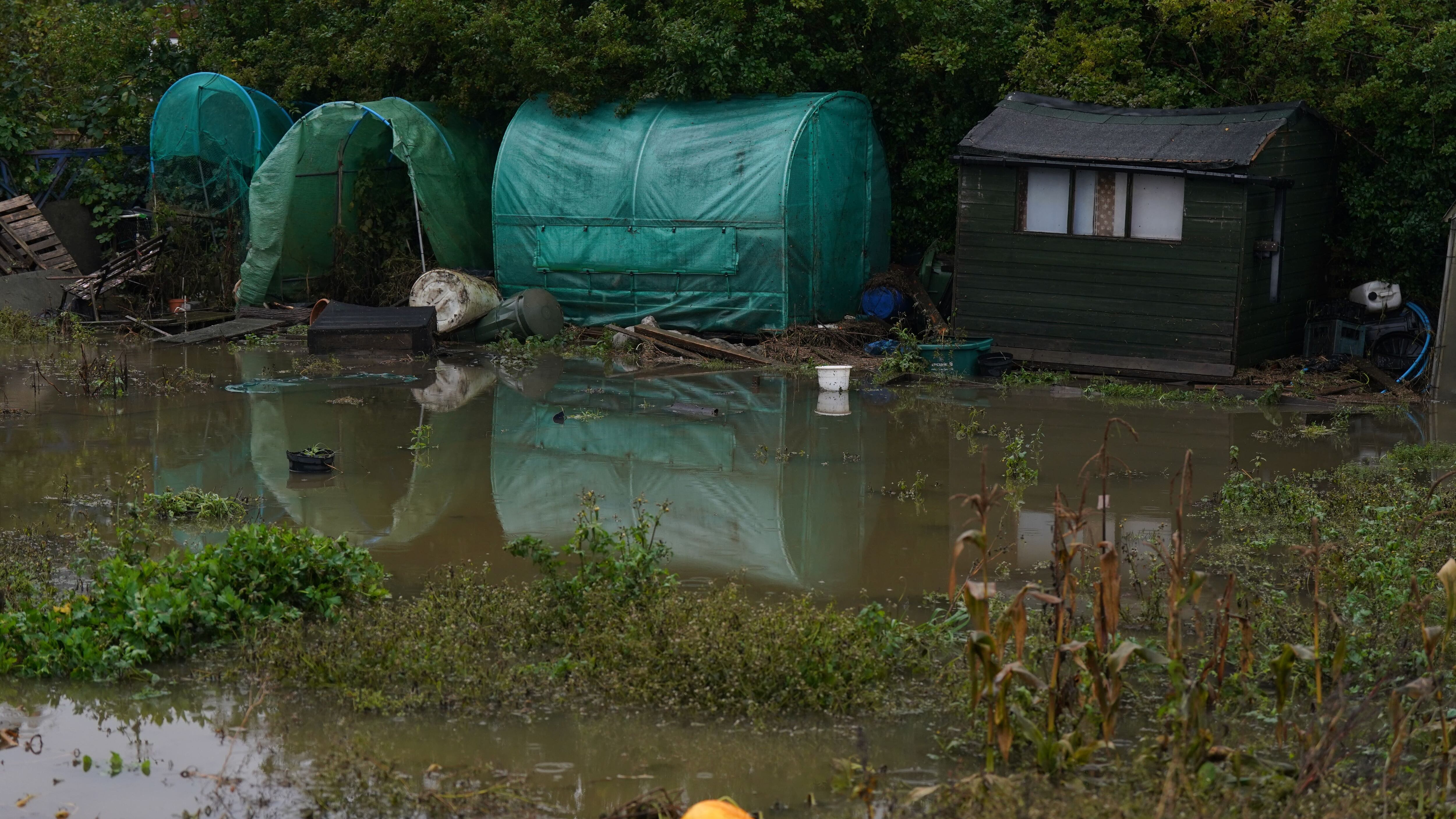 Debris and floodwater in allotments in Retford, Nottinghamshire, after Storm Babet passed through the area (Jacob King/PA)