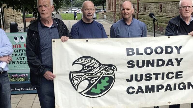 Relatives of Bloody Sunday victims, William McKinney, Jackie Duddy, Patrick Doherty, Michael Kelly and Kevin McElhinney pictured during a rally at Guildhall Square