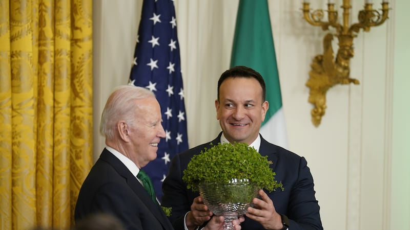 Taoiseach Leo Varadkar, right, presents US President Joe Biden with a bowl of Shamrock during a St Patrick’s Day Celebration reception in 2023