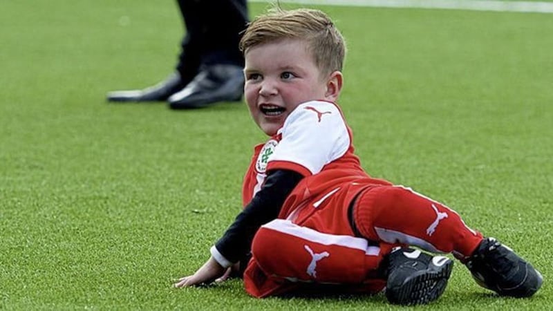 West Belfast four-year-old D&aacute;ith&iacute; Mac Gabhann, who is awaiting life-saving heart surgery, was last night said to be &quot;jumping for joy&quot; after a goal he scored at Solitude last weekend was name `Goal of the Month&#39;. Picture by Kieran Hinds 