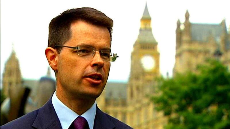 In his first full day in office, James Brokenshire said the British and Irish governments were opposed to a return to border check points between north and south 