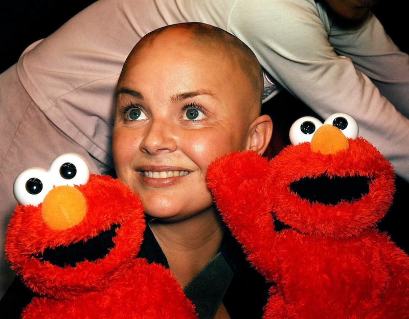 Broadcaster Gail Porter poses with TMX Elmo toy at Hamleys in 2005