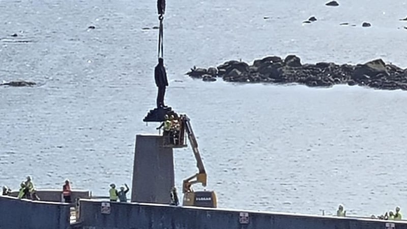 A Roger Casement statue has been lifted into place at a new jetty. Picture by D&uacute;n Laoghaire-Rathdown Libraries from Twitter 