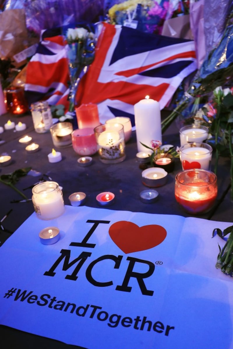 Tributes to victims in Albert Square, Manchester