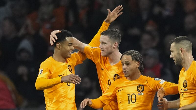 Wout Weghorst, second left, scored the only goal of the game in Amsterdam (Peter Dejong/AP)