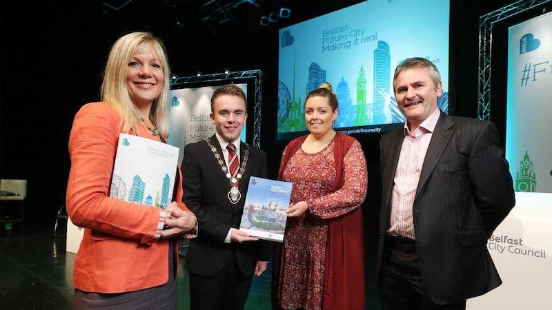 Deputy lord mayor Guy Spence at the launch of the City Centre Regeneration Strategy at the Belfast Waterfront with Council chief executive Suzanne Wylie and councillors Deirdre Hargey and Declan Boyle 