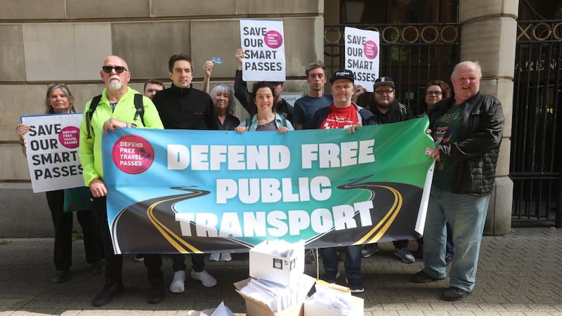 Campaigners against changes to the SmartPass travel system pictured outside the Department for Infrastructure's offices in Belfast on Tuesday. Picture by Mal McCann