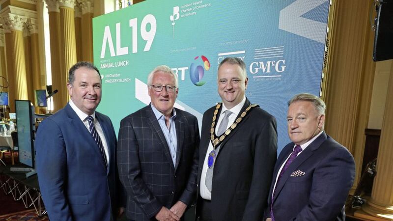 NI Chamber president John Healy (second right) and Paul Murnaghan, regional director of BT Business in Northern Ireland, who sponsored the lunch, with sporting legends Pat Spillane and Eddie O&rsquo;Sullivan, who took part in a Q&amp;A 