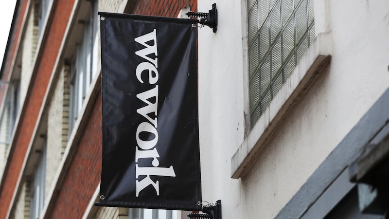 Office-sharing company WeWork has seen shares plunge following reports it is is preparing to file for bankruptcy (Jonathan Brady/PA)