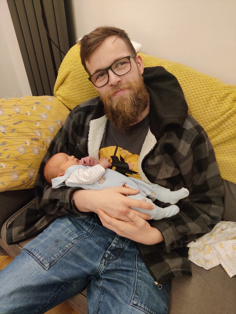 Brad Girvan with baby Finn