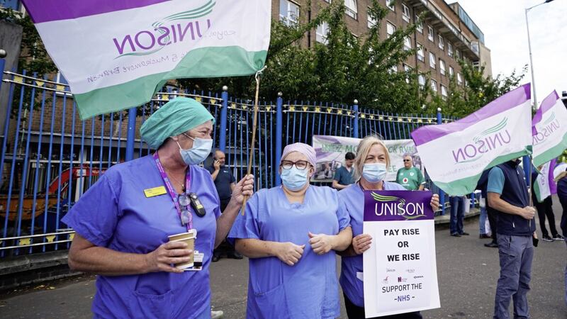 Unison members taking part in a protest outside the Royal Victoria Hospital in Belfast in October 