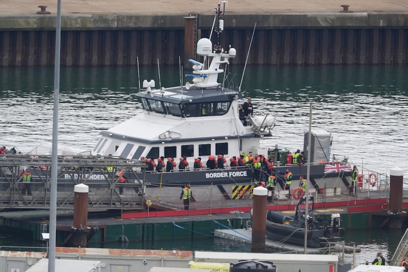Migrants were brought ashore by Border Force in Dover on Tuesday