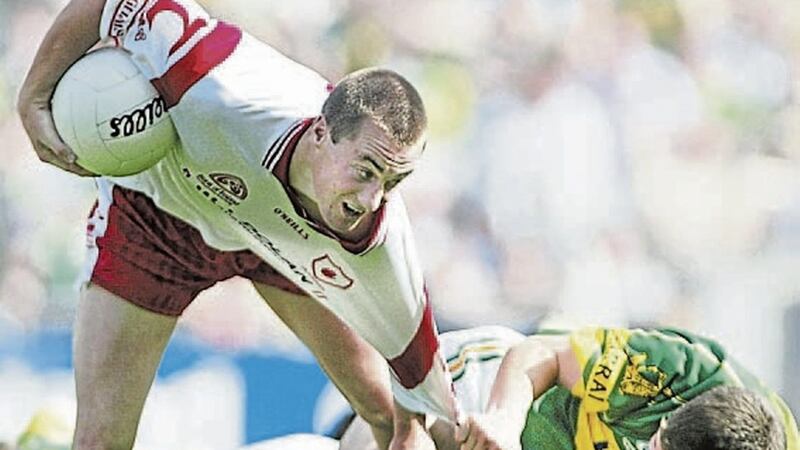 Current Kerry manager &Eacute;amonn Fitzmaurice restricts the advances of Brian McGuigan by whatever means possible during the 2003 All-Ireland semi-final between the Kingdom and Tyrone. The Red Hands, of course, emerged triumphant that day, but not before leaving their own mark on Kerry with some on-the-edge tackling and defensive intensity that allowed Jack O&rsquo;Connor&rsquo;s men just six points in a seven-point reverse 