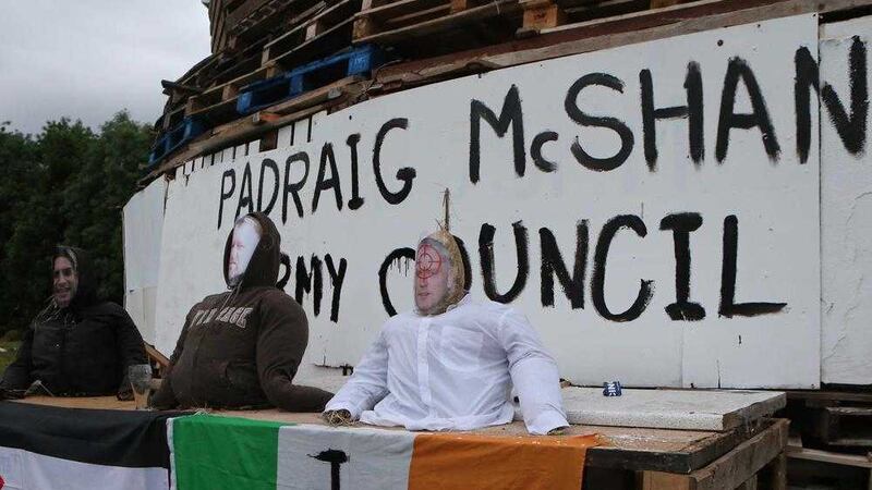 An effigy of Padraig McShane, independent Derry councillor Gary Donnelly and a Palestinian official were placed on a loyalist bonfire in Bushmils, Co Antrim