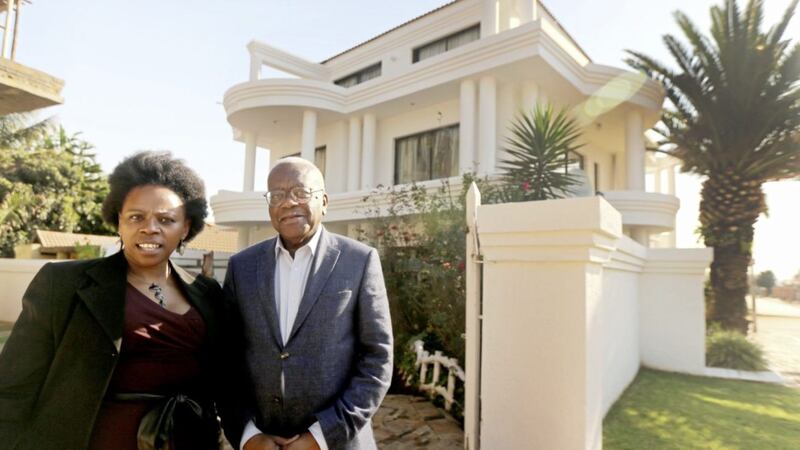 Soweto Estate Agent Matseleng Mogodi withTrevor McDonald. Under apartheid black people were banned from owning houses and forced to live in townships &copy; ITV 