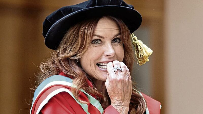 Derry's Roma Downey,  Hollywood actress and film director at the University of Ulster, Magee, Derry, on Monday where she received the honorary degree of Doctor of Fine Art, for outstanding contribution to acting and philanthropy. Picture Margaret McLaughlin © please by-line  7-7-14.