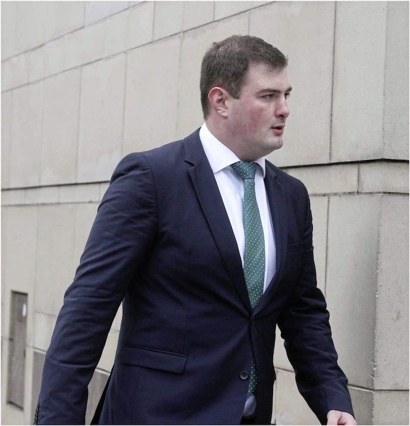 Rory Harrison on the way into court n Belfast Picture by Hugh Russell. 