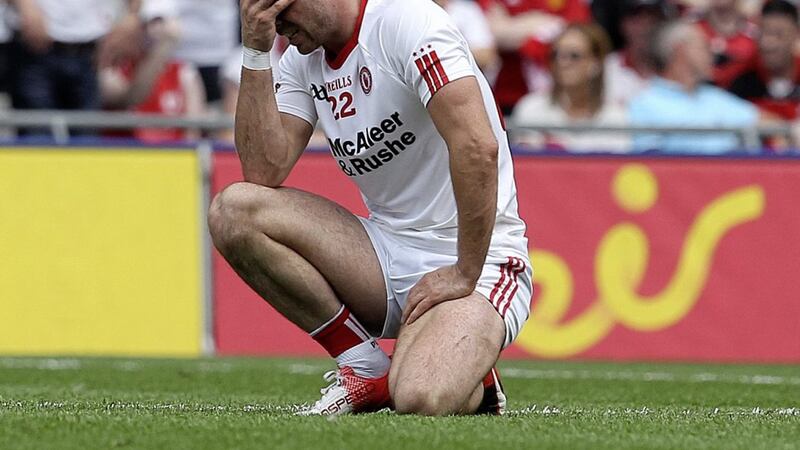 Darren McCurry shows his disappointment after Tyrone&#39;s All-Ireland SFC quarter-final exit to Mayo last summer 