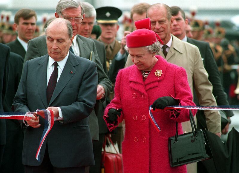 Queen Elizabeth II and then president Francois Mitterrand of France cut the ribbon to officially open the Channel tunnel