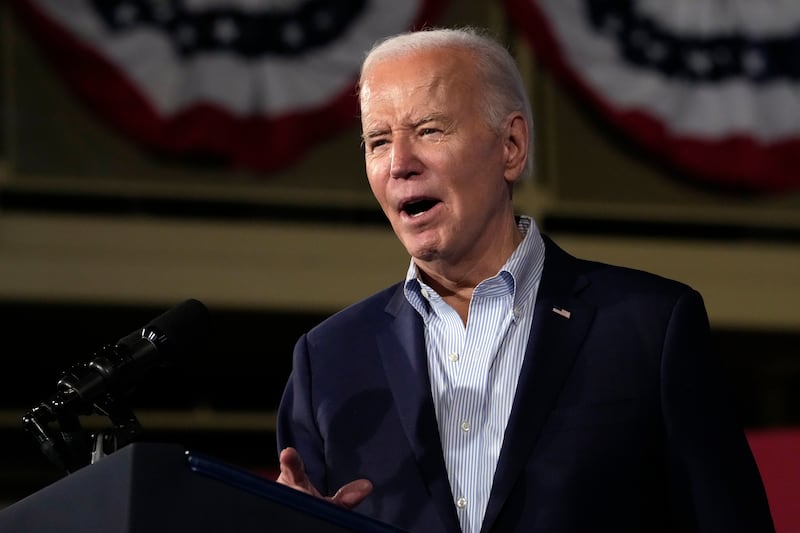 Mr Biden has described his Republican rival as a threat to democracy (Jacquelyn Martin/AP)