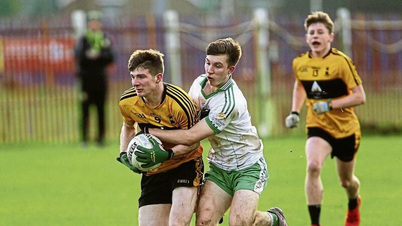 Aaron Deeney of St Eunan&#39;s and Burren&#39;s Peter Fagan during yesterday&#39;s preliminary round game at St Paul&#39;s Picture by Seamus Loughran 