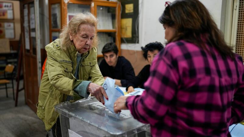 A woman votes at a polling station in Istanbul (AP Photo/Emrah Gurel)