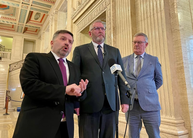 Health Minister Robin Swann (left), UUP leader Doug Beattie (centre) and UUP MLA Mike Nesbitt speaking after the Stormont Executive agreed a budget not supported by the party