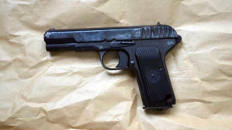A hand gun that was recovered following searches in Derry