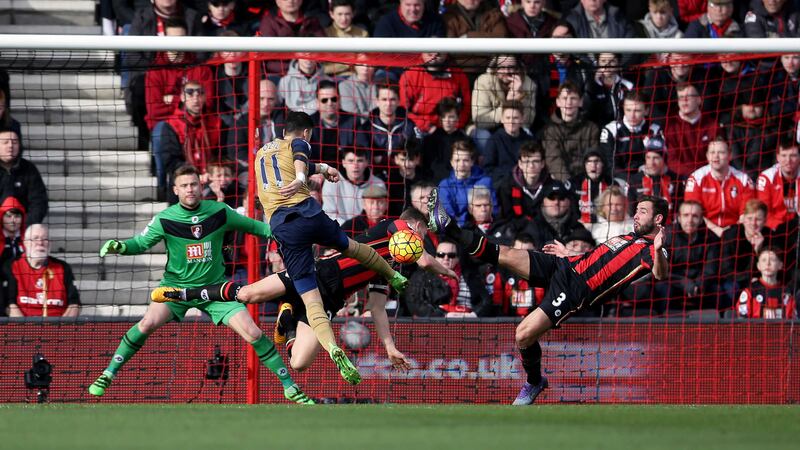 Mesut Ozil opens the scoring for Arsenal in Sunday's Barclays Premier League match against Bournemouth at the Vitality Stadium<br />Picture by PA&nbsp;