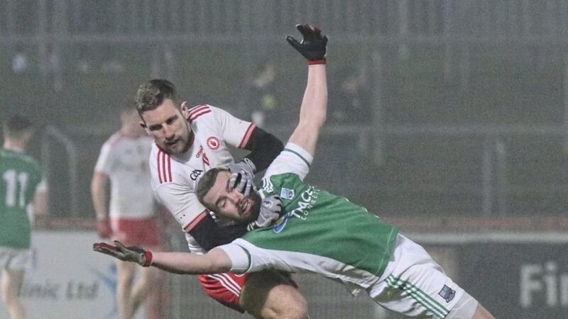 Tyrone&#39;s Niall Sludden in a tussle with Fermanagh&#39;s James McMahon at Healy Park Picture by Jim Dunne 