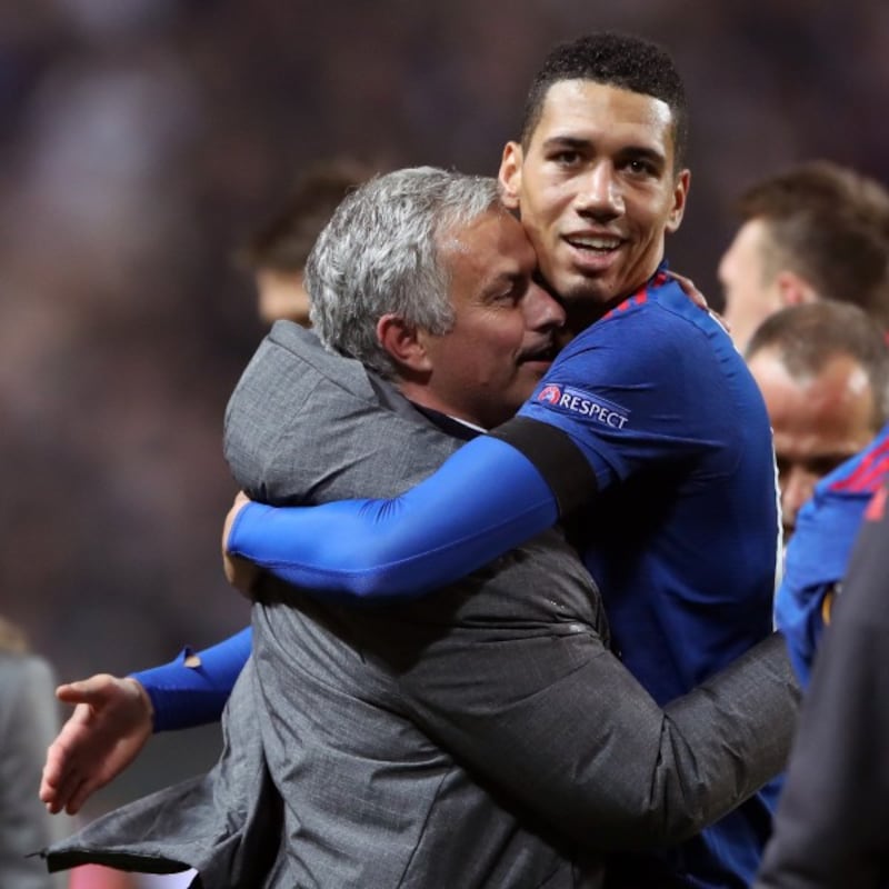 Manchester United manager Jose Mourinho and Chris Smalling