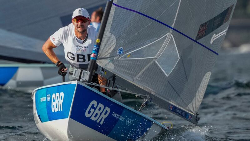 Scott spoke to his parents via video call after securing a second successive Olympic gold in the men’s Finn.