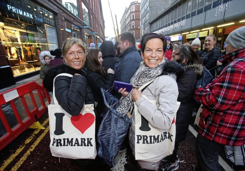 Sharon Watters and Angela Cook from Belfast: Shoppers queued from 6am on Saturday for the reopening of Belfast&#39;s Primark store. Around a thousand shoppers filled Castle Street for the grand reopening. Picture by Mal McCann 