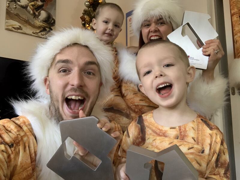 Mark and Roxanne Hoyle with their children, Kobe and Phoenix, celebrating a third Christmas number one