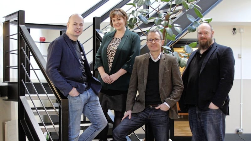 Audrey Osborne from Techstart Ventures pictured with (from left) Cloudsmith&#39;s Lee Skillen, Peter Lorimer and Alan Carson 