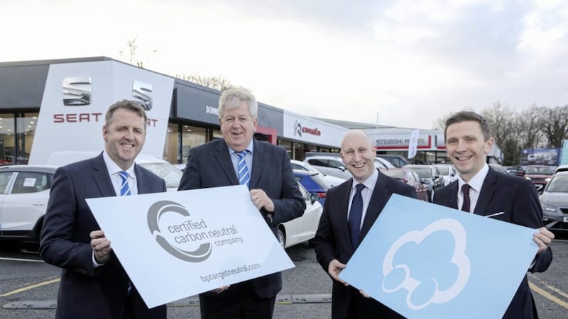 Pictured are Donnelly Group managing director Dave Sheeran and director Raymond Donnelly; Stephen Walker, Castrol and Michael Capper, BP Target Neutral. 