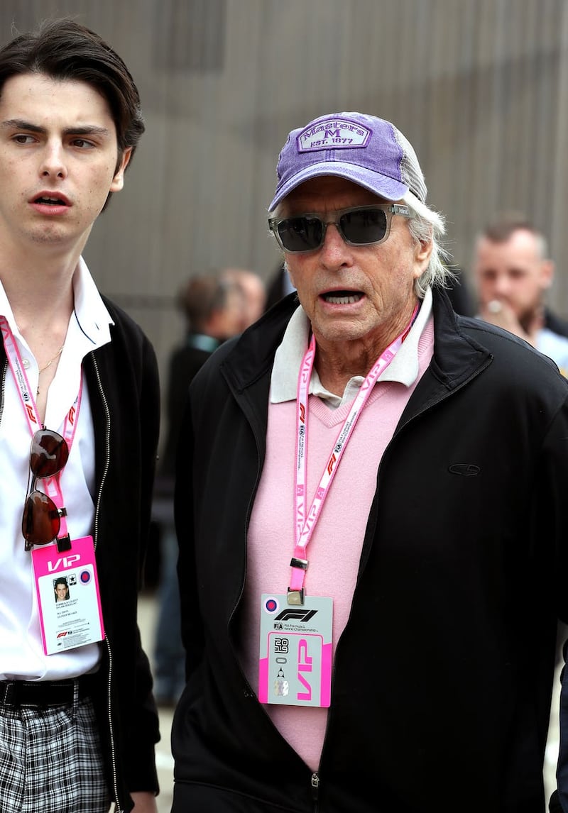 Dylan Michael Douglas, left, and Michael Douglas arrive during the British Grand Prix at Silverstone