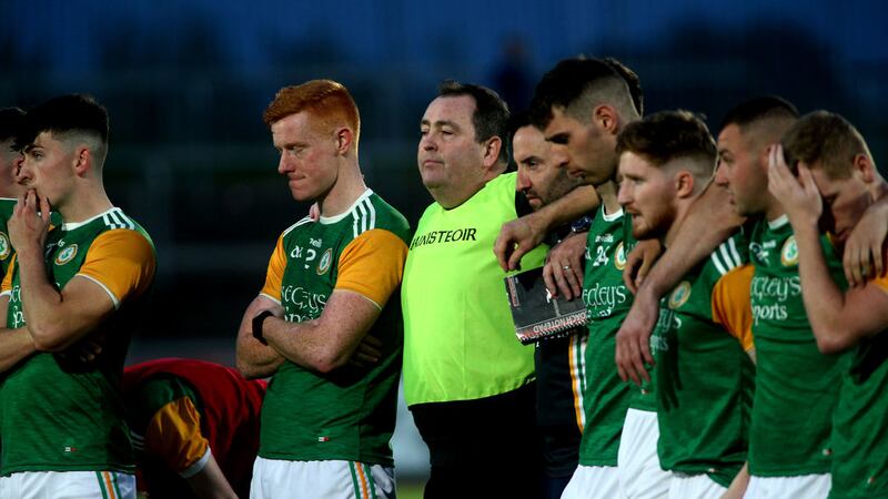 Dungannon Clarke's manager Chris Rafferty with players during the Tyrone SFC Final penalty shoot-out.<br />Picture Seamus Loughran&nbsp;