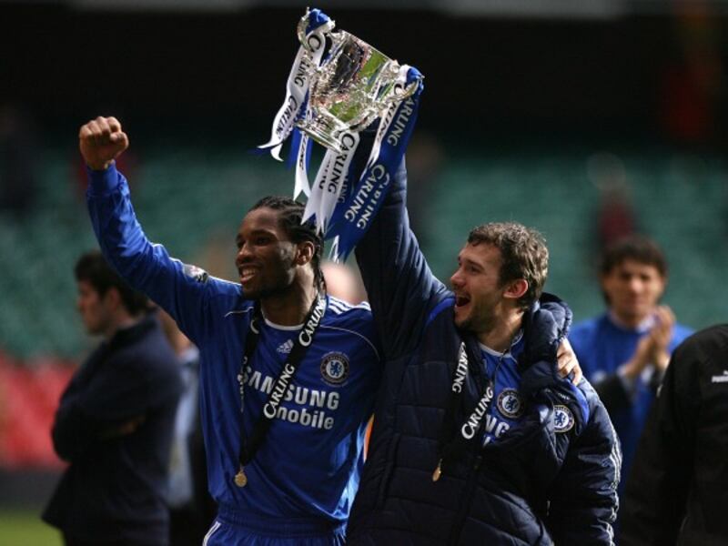 Didier Drogba celebrates winning the League Cup with Chelsea