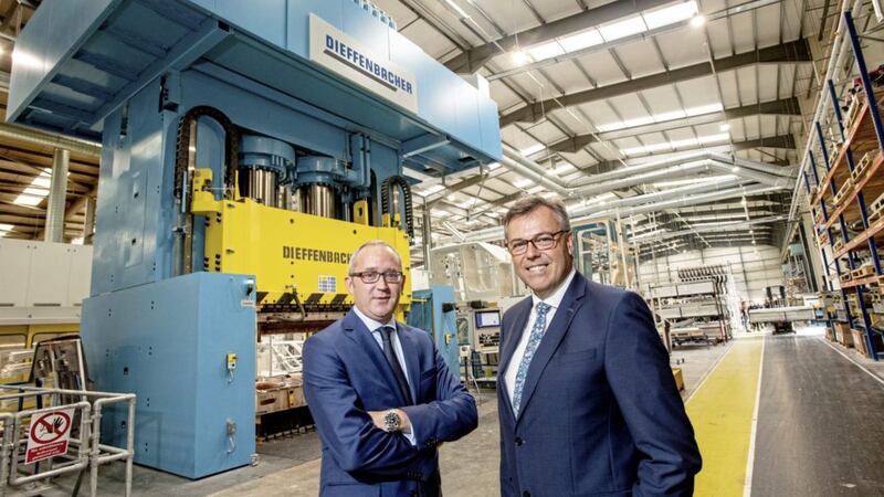 Pictured at the Creative Composites Lisburn factory are managing director, Jonathan Holmes and Alastair Hamilton, chief executive of Invest NI. 