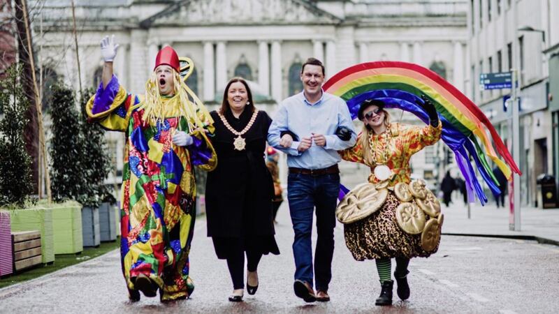 Lord Mayor of Belfast, Councillor Deirdre Hargey, and Q Radio presenter Gareth Stewart join characters from Beat Carnival at the launch of the St Patrick&rsquo;s Day celebrations in front of City Hall. 