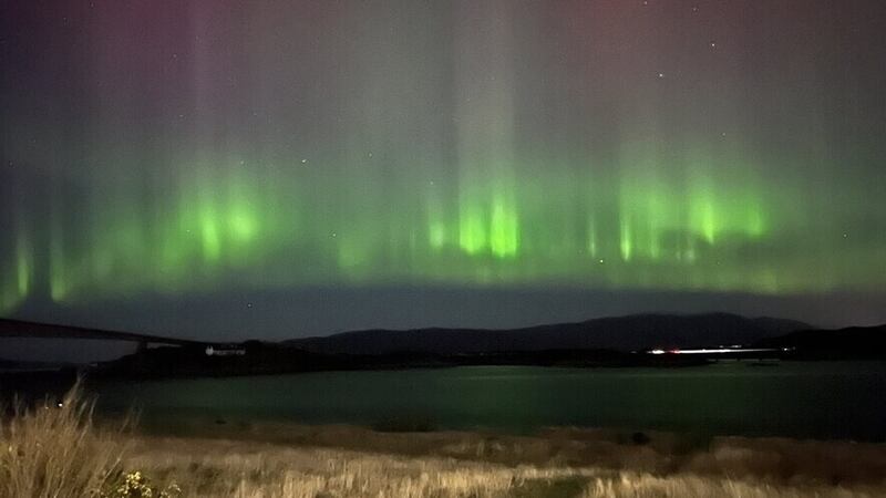 The northern lights are caused by solar winds colliding with the Earth's upper atmosphere, and may be visible over Northern Ireland in the days ahead, the Met Office has said.