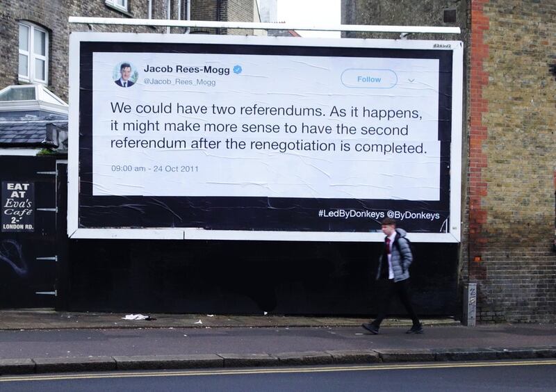 A billboard showing Jacob Rees-Mogg suggesting the possiblity of two EU referendums
