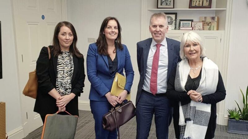 (From L-R) Anna Mercer from Stratagem NI, Claire McKeegan of Phoenix Law, civil service head David Sterling and Margaret McGuckin of Savia 