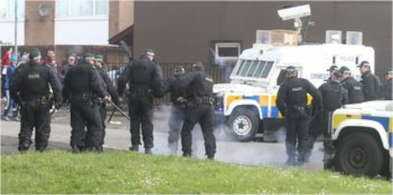 Fireworks were thrown as police moved in to the New Lodge. Picture by Hugh Russell&nbsp;
