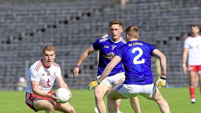 Tyrone&#39;s Peter Harte and Cavan&#39;s Jason McLoughlin and Ciaran Brady battle it out at Clones on Saturday. Picture by Philip Walsh. 