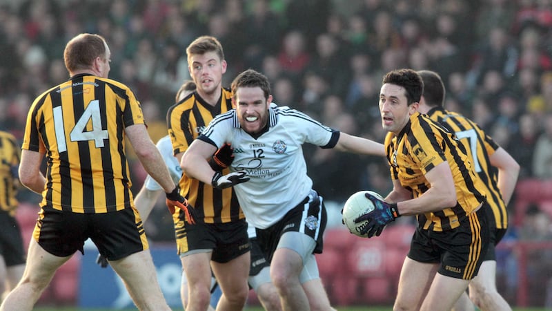 Rory Kavanagh in possession for St Eunan's during last year's Ulster Senior Club Championship semi-final match against Omagh