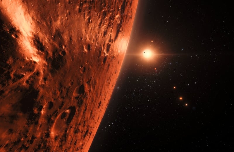 Artist impression showing the view just above the surface of one of the planets in the TRAPPIST-1 system