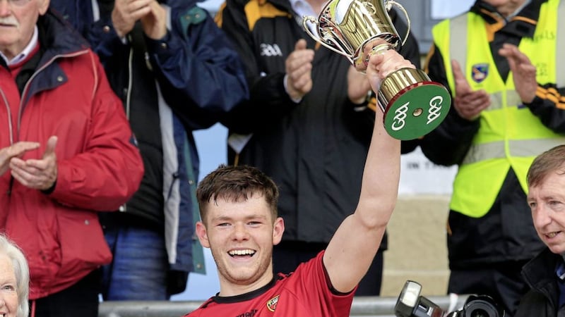Down&#39;s Shane Annett raises the Leo Murphy Cup in Armagh last week Picture by Philip Walsh. 